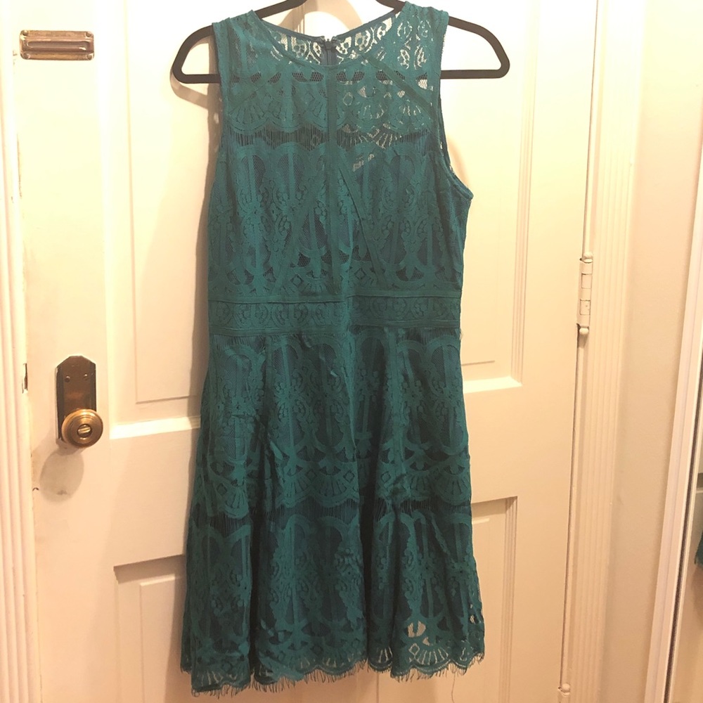 Lace dress with peek-a-boo bodice